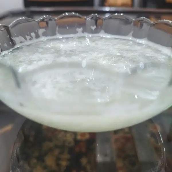 Fresh aloe vera gel being applied to skin to demonstrate how to use aloe vera on face for a natural glow.